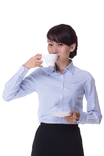 年轻的亚洲商务女性喝咖啡图片下载