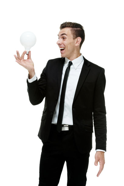 兴高采烈的商人拿着灯泡图片下载