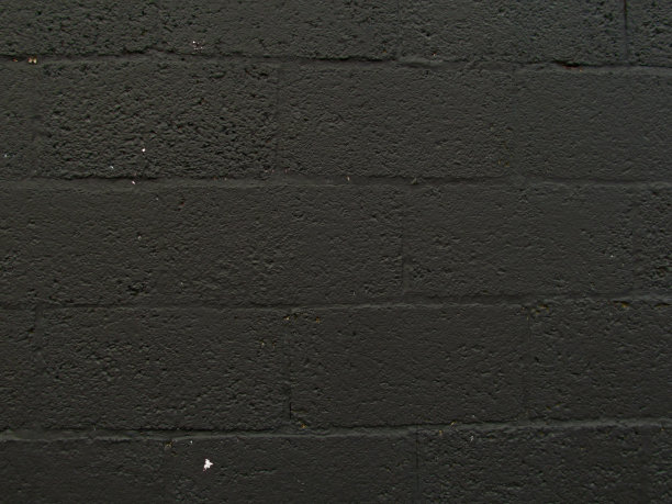 黑色混凝土砌块墙图片下载