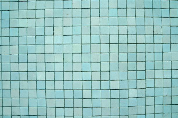 蓝色瓷砖的凹凸不平的墙图片下载