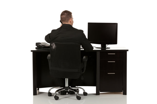 商人坐在他的办公室里图片下载