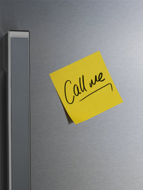 冰箱门上的黄色纸条图片下载