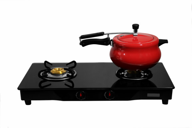 红色压力锅上的燃烧器炉图片下载