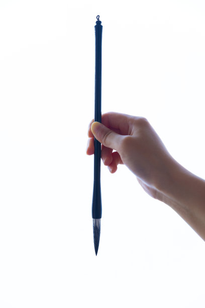 手握毛笔图片下载