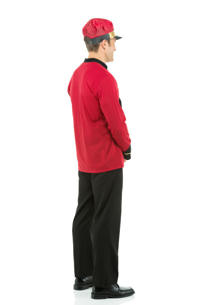 一个微笑的贴身男仆的侧面图片下载