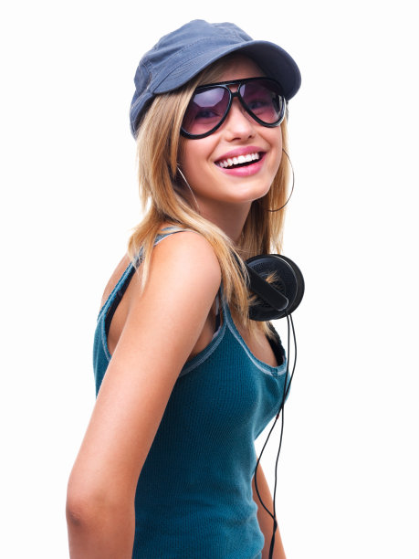 戴着耳机的快乐女孩的肖像图片下载