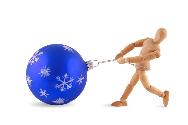 圣诞工作-木制人体模型在工作图片下载