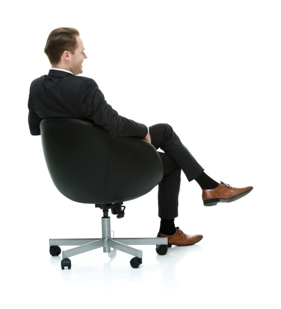 商人坐在椅子上的后视图图片下载