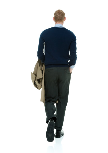 商人行走的后视图图片下载