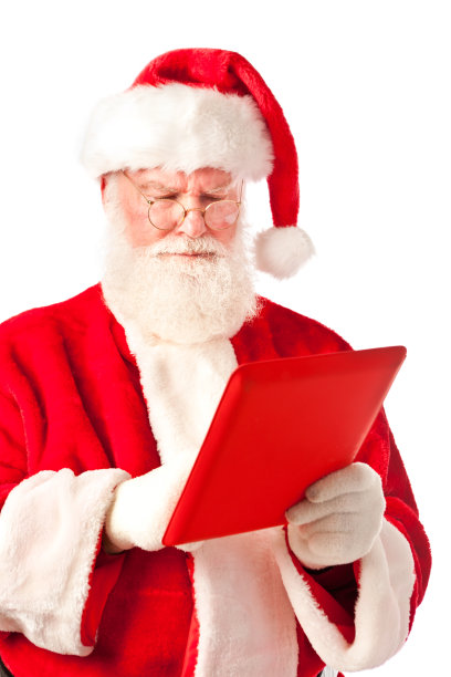 圣诞老人指着红色的平板电脑图片下载