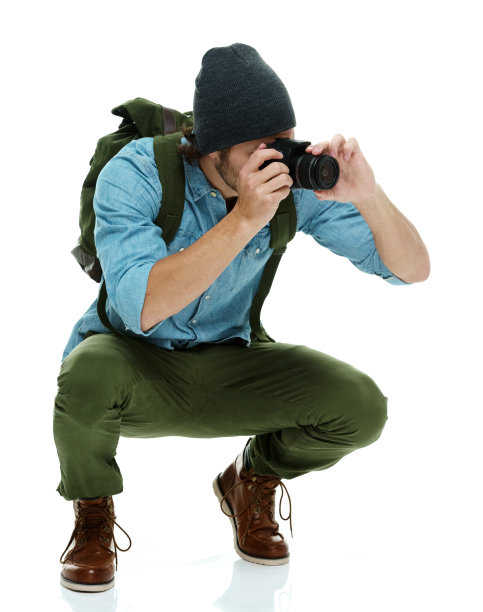 男性摄影师在行动图片下载