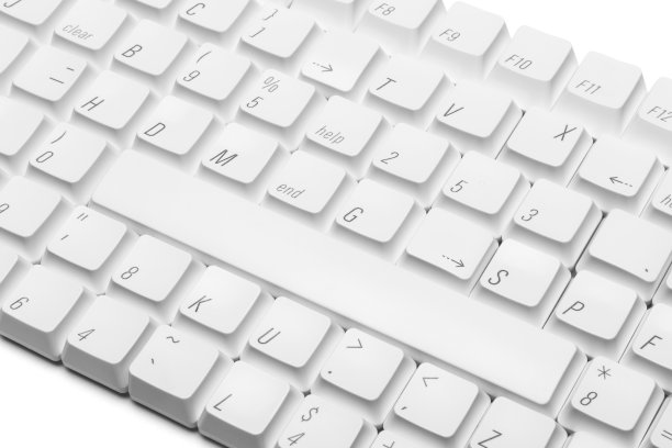 电脑键盘上松散的白色按键的特写图片下载