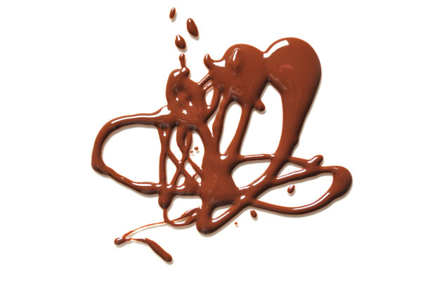 在树脂玻璃上融化的巧克力创造了一个设计图片下载