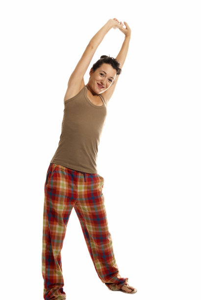 年轻女子被困穿着睡衣孤立在白色的背景图片下载