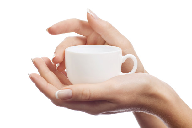 咖啡杯在女性手中图片下载
