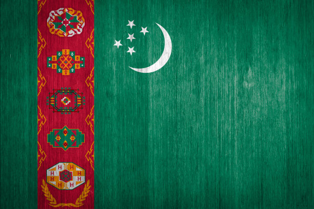 木材背景上的土库曼斯坦国旗图片下载