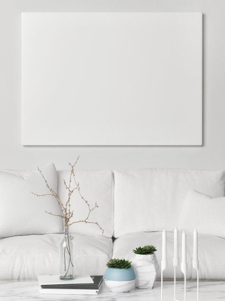 白色沙发上的海报，时髦的客厅图片下载