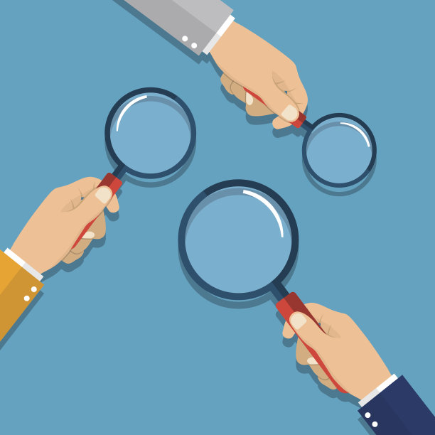 手里拿着放大镜素材图片