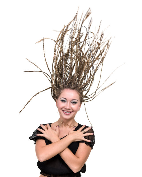 年轻的微笑女人的肖像与飞扬的长发绺图片下载