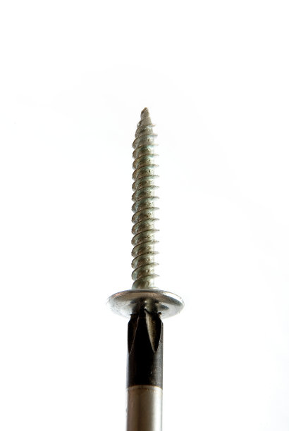 仪器。金属螺丝和十字螺丝刀准备工作。图片下载