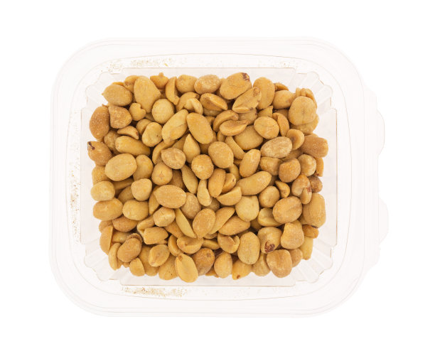 白色背景上的烤味花生容器图片下载