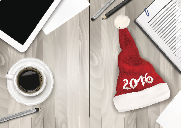 有圣诞老人帽，平板电脑和办公用品的办公室背景。部图片下载