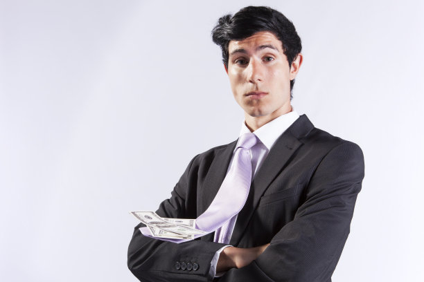 商人和飞领带与金钱图片下载