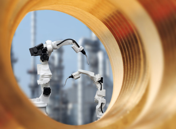 用于工厂焊接的白色机械臂图片下载