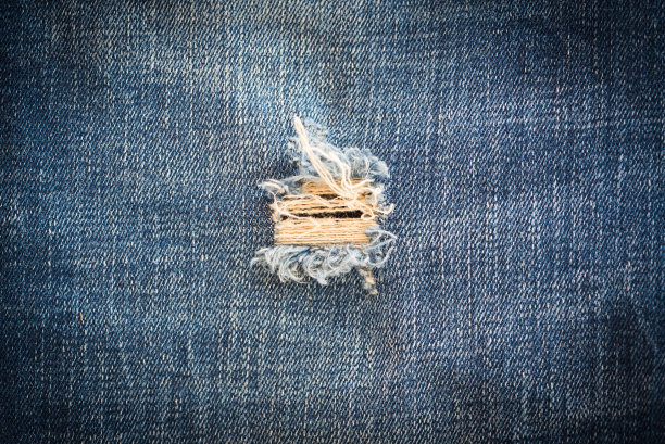 条纹纹理蓝色牛仔裤为背景图片下载