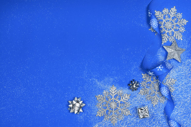 圣诞装饰背景上的蓝色背景。图片下载