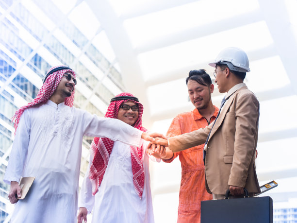 一群生意伙伴是双手协调的。团队精神和经营理念。图片下载