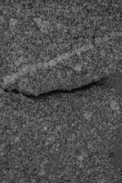 摘要灰色纹理。石头和岩石背景。自然的纹理。黑色和灰色抽象纹理和背景为设计师。天然石材的模式。宏观和近景的灰色石头。图片下载