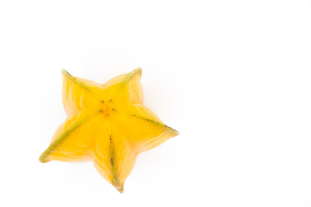 白色背景上的黄色杨桃、苹果、水果或杨桃图片下载