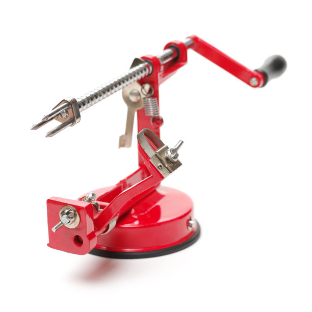 白色背景上的苹果削皮器图片下载