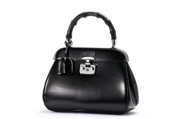 黑人女性的手提包被孤立在白人背景下图片下载