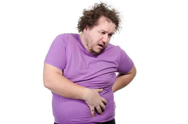 腹泻有趣的超重的人。白色背景。图片下载