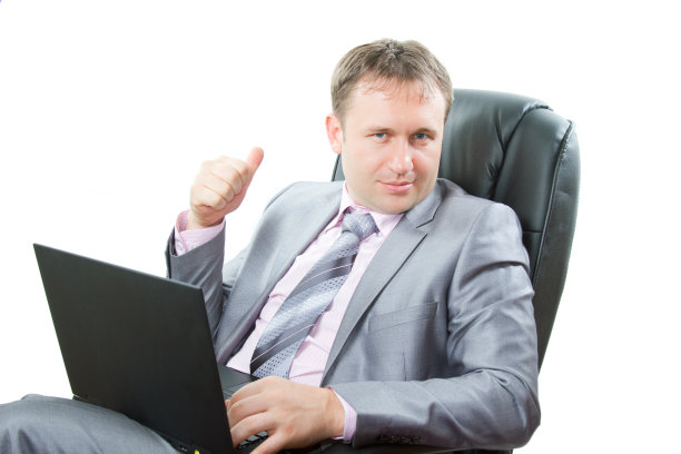 成功人士用手提电脑展示拇指图片下载