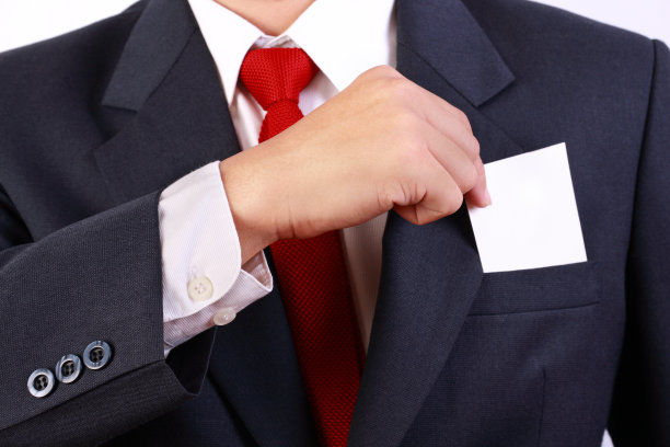 拿着空白白牌的商人图片下载