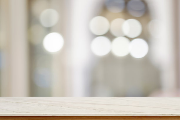 空荡荡的大理石桌面和模糊的抽象背景。图片下载