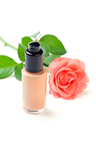 粉底霜的特写镜头，上面有一朵花图片下载