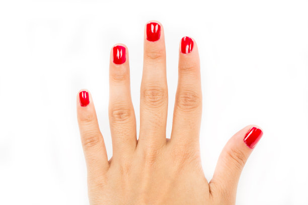 漂亮的指甲被涂成红色。图片下载