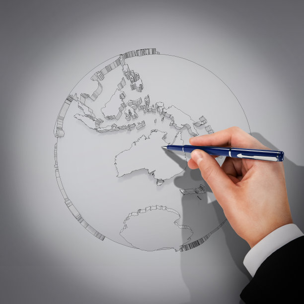 男手用笔画蓝图。地球图片下载