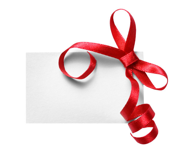 一个白色的礼物标签，用红丝带系成一个蝴蝶结图片下载