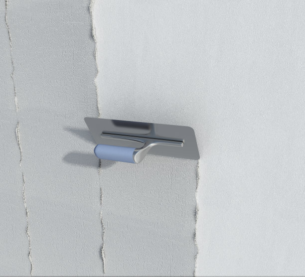 施工用泥铲和带有纹理的灰泥墙壁图片下载