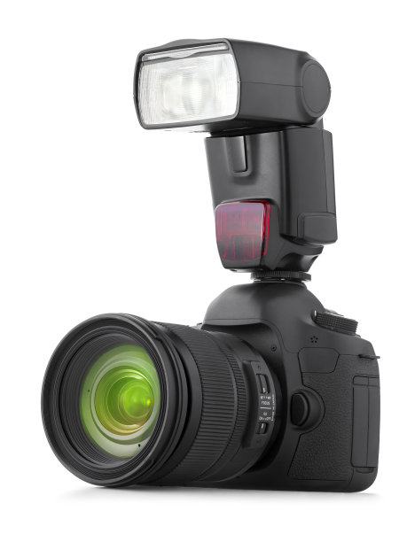 带镜头和闪光灯的数码相机图片下载