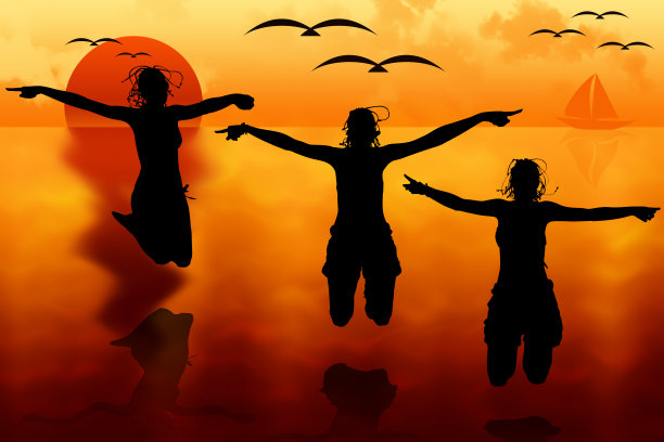 女人们在夕阳下跳跃图片下载