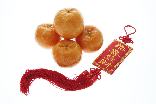 橘子和悬挂的饰品素材图片