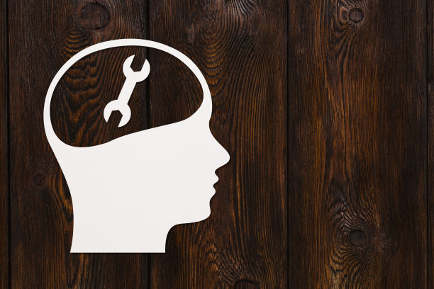 带扳手或扳手标志的纸头。抽象概念形象图片下载