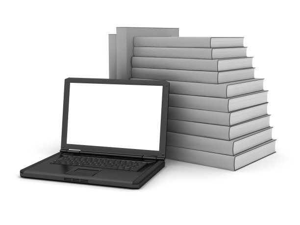 灰色封皮的书和笔记本电脑图片下载