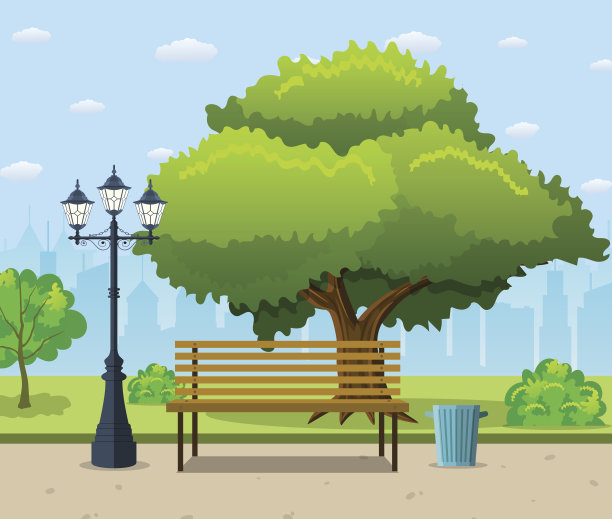 城市公园的长椅下有一棵绿色的大树素材图片